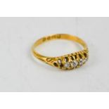 An 18ct gold and diamond ring, 3g.