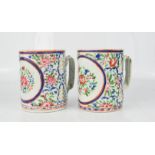 A pair of 19th century Chinese famille rose mugs, 12cm high