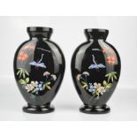 A pair of glass and painted bohemian vases depicting dragonfly and flowers. 24.5cms tall