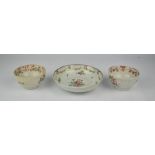 Two 19th century bowls and a dish, decorated with flowers, 13cm diameter.