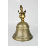 A 19th century bronze temple bell with deity on a bird.