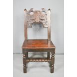 A small 17th century Manchester oak wainscot chair.