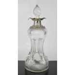 A 19th century glass and silver collared decanter, with original spiral form stopper, indistinctly