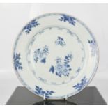 A 19th century Delft blue and white plate, 23cm diameter.