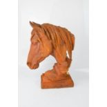 A cast iron horse head, 42cm high.