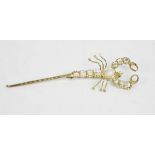 A silvered metal and moonstone set brooch, in the form of a Scorpion. A/F