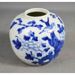 A 19th century blue and white Chinese jar, depicting bird amidst trees and flowers, 12cm high.