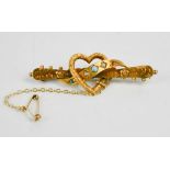 A 9ct gold sweetheart brooch, of heart form, 3.1g.