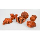 A group of six netsukes; zodiac ball, tortoise, lion, buffalo.