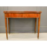 A 19th century mahogany serpentine tea table, 73 by 92 by 45cm.