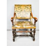 An 18th century walnut Italian tooled leather chair. 96cms tall x 74cms deep x 57cms wide
