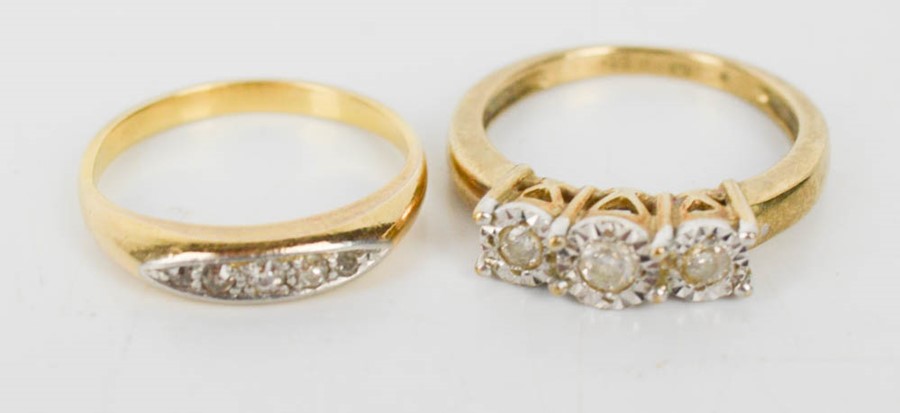 Two 9ct gold rings, one with three diamonds, 6.1g. The three diamonds ring is size N, the other is