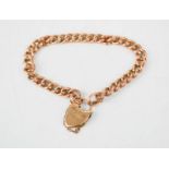 A 9ct rose gold chain bracelet, with heart form clasp and safety chain, engraved May 25th 1896, 11.