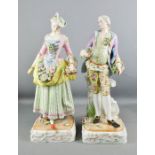 A pair of Meissen porcelain German 19th century figures, lady and gentleman in period attire holding