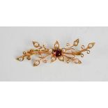 A 9ct gold, seed pearl and citrine brooch of flower form, 4.8g.