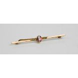 A yellow metal mounted garnet and seed pearl bar brooch, 2.2g.