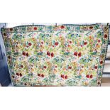 A large crewel work panel / wall hanging, depicting floral groups, 6ft by 9ft.