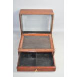 A mahogany display case, with glazed lid sliding off to reveal a box with single drawer. 32cms x