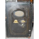 An Antique safe by J Cartwright and Son, 1844. 43 cms wide x 41cms deep x 61cms tall