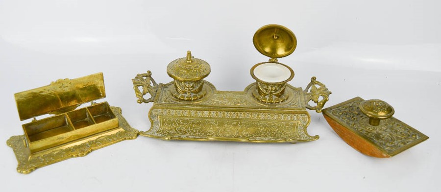 A brass desk set, with inkstand, blotter and stamp box.