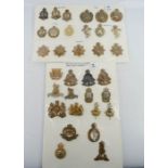 A group of British military Corps and departments cap badges. (33)