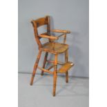 A Victorian oak children's high chair.