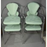 A set of four Effczeta Italian chairs in mint green and chrome.