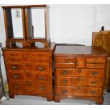 A group of furniture to include walnut veneered cabinet, chest and matching side tables.