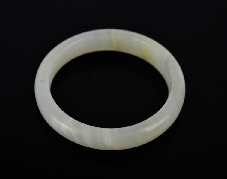 A Chinese natural Dushan white jade bangle.