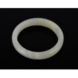 A Chinese natural Dushan white jade bangle.