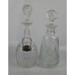 Two cut glass decanters.