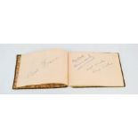 An autograph book containing autographs for Laurel & Hardy, Tessie O'Shea and others, circa 1950.