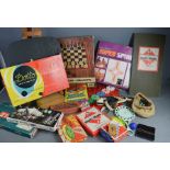 A large quantity of toys to include monopoly, tiggly winks, dominoes, spirograph, marbles and