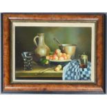 An oil on canvas still life of peaches, jug, glass on a tablecloth, oil on board, 29 by 39cm.