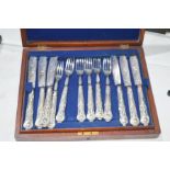 A boxed set of twelve pairs of Victorian plated fish eaters, in the Queens pattern, Howson Brothers,