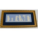 A Wedgwood blue Jasperware plaque depicting classical scenes together with a selection of Wedgwood