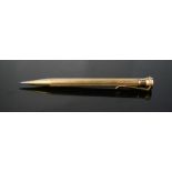 A 14ct rolled gold propelling pencil, with machine engraved decoration.