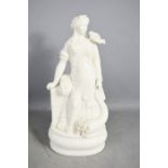A Parian ware figure of lady with dove on shoulder.