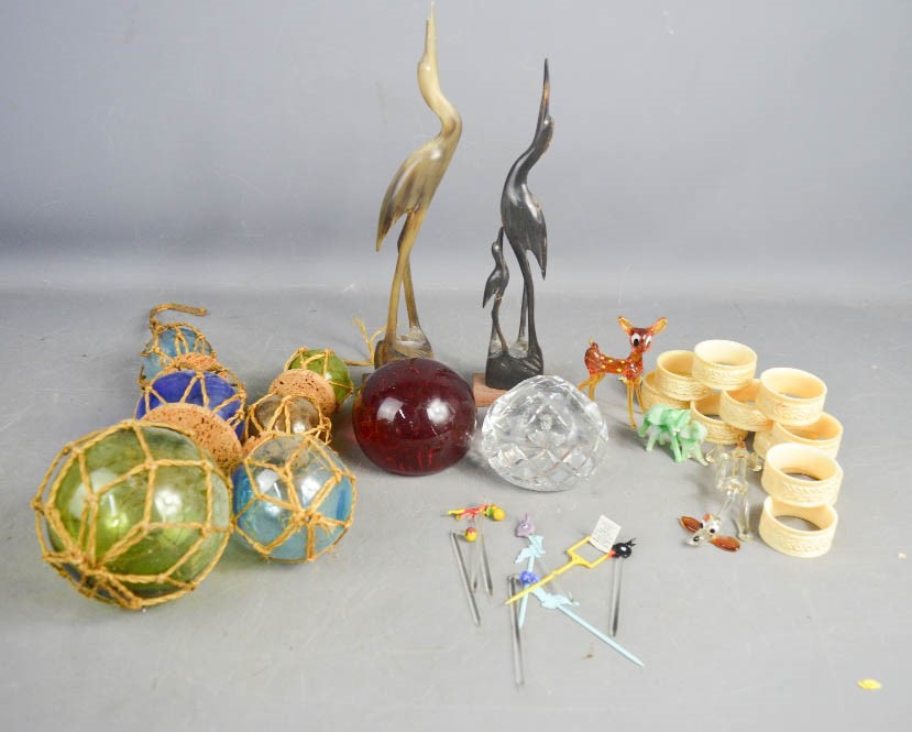 A group of glass animals, glass cocktail stick, paperweights, napkin rings etc.