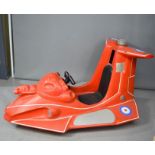 A fibreglass fairground ride in the form of Red Arrows plane.