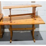 A pine kitchen trestle table and bench.