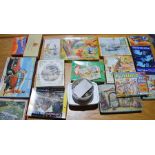 A quantity of vintage jigsaws, some vintage examples.