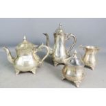 A silver plated teapot, coffee pot, milk and sugar bowl.