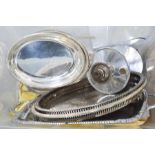 A quantity of silver plateware including two lidded tureens, trays and a burner.