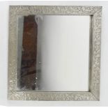 CRB Coleman hand worked pewter arts & crafts mirror, 27 by 27cm.