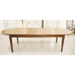 An oak refectory table with rounded ends, square tapered legs, 286 by 94 by 76cm.