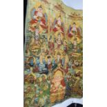 A Tibetan Nepal silk embroidery, with gold thread embellishment, depicting Buddhas.