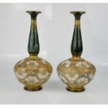 A pair of Royal Doulton stoneware vases, impressed 5116 to the abse, 27cm high.