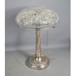 A 1920s lamp and a crystal shade.