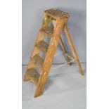 A set of pine antique ladders.